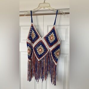 Crochet crop-top with tassel detail